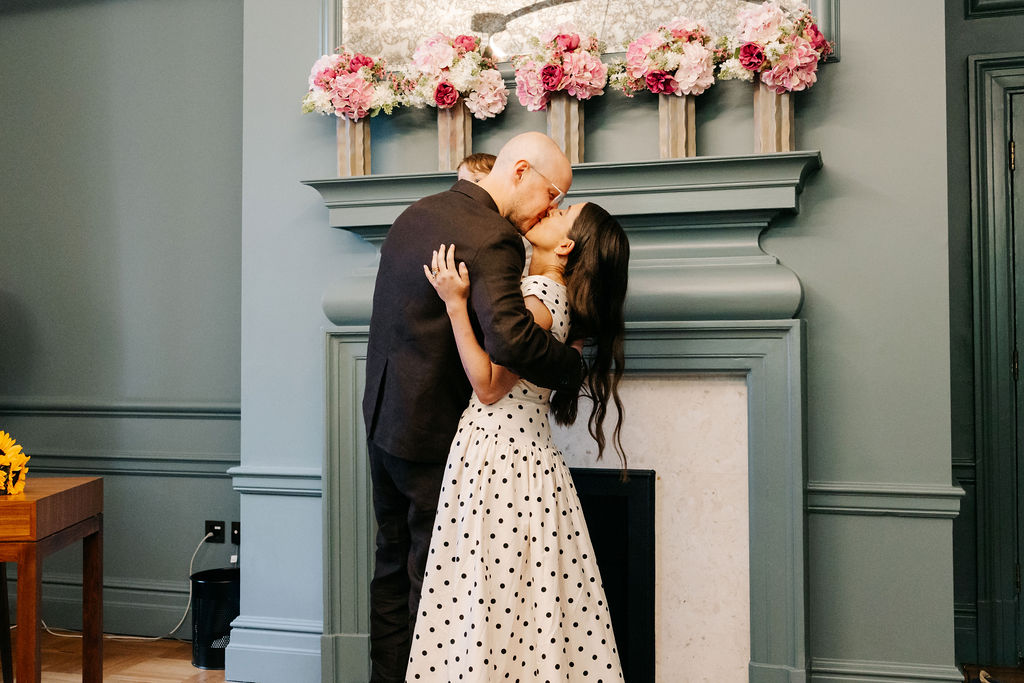 Josh and Frankie sharing a kiss after their vows